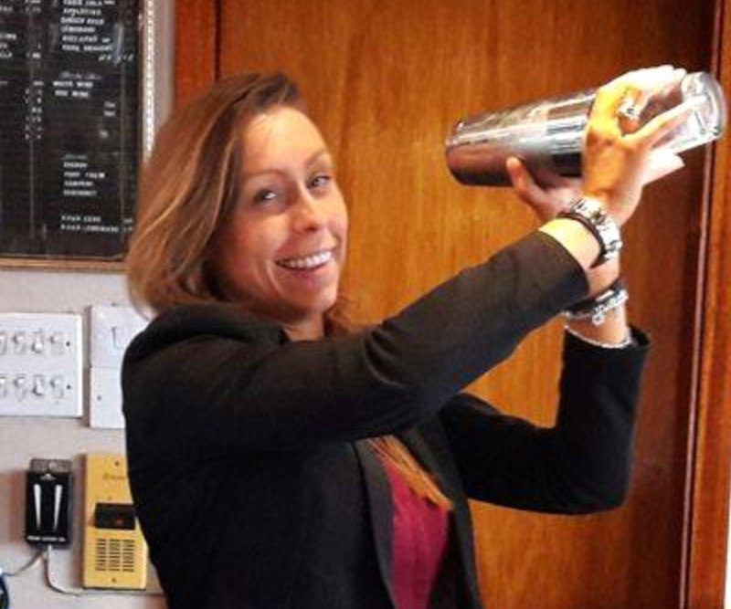 Our hotel bar staff, a girl making cocktails