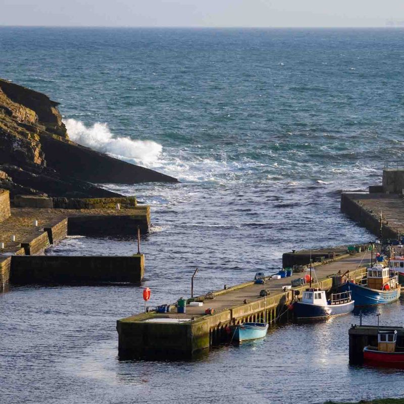 Lybster Harbour with waves crashing