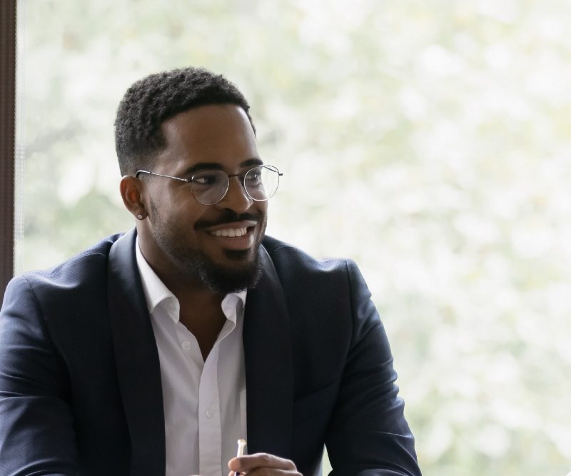 Happy diverse different aged business team discussing work