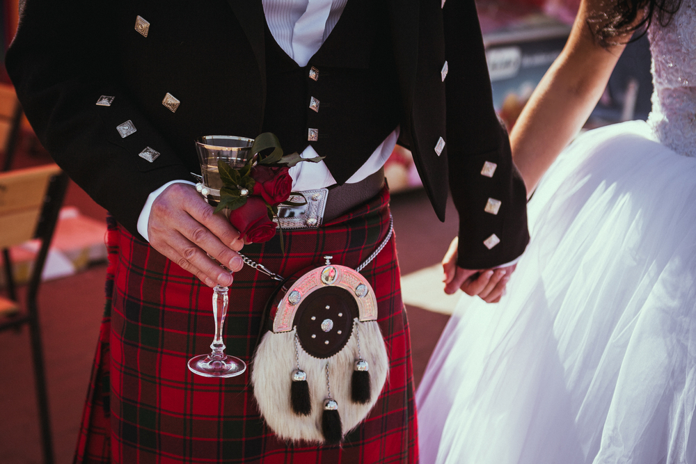 Beautiful Scottish couple groom and bride. National traditional clothing - kilt.